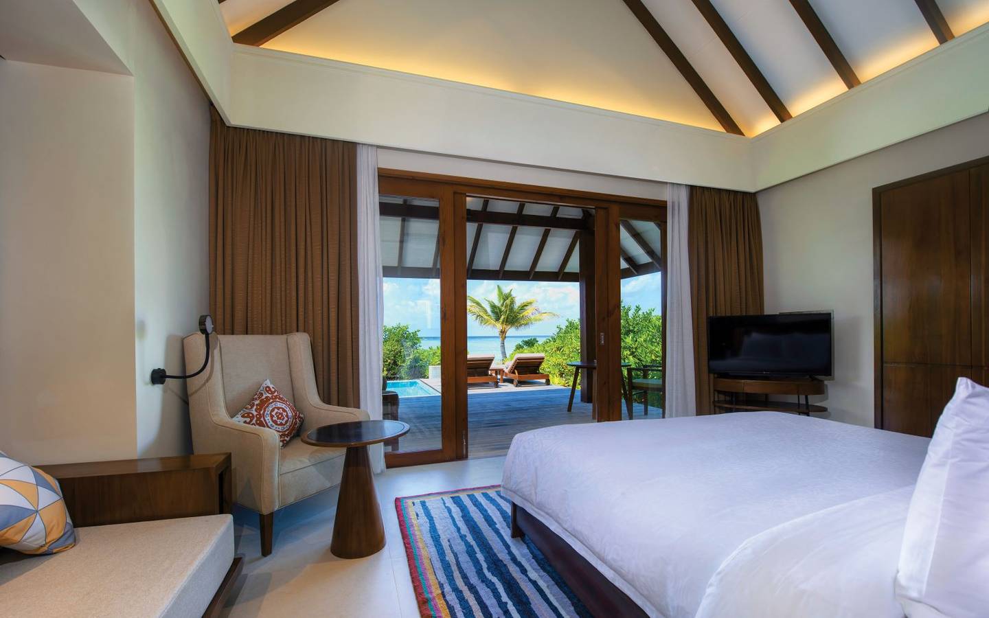 varu-by-atmosphere-maldives-beach-villa-with-pool-bedroom-view