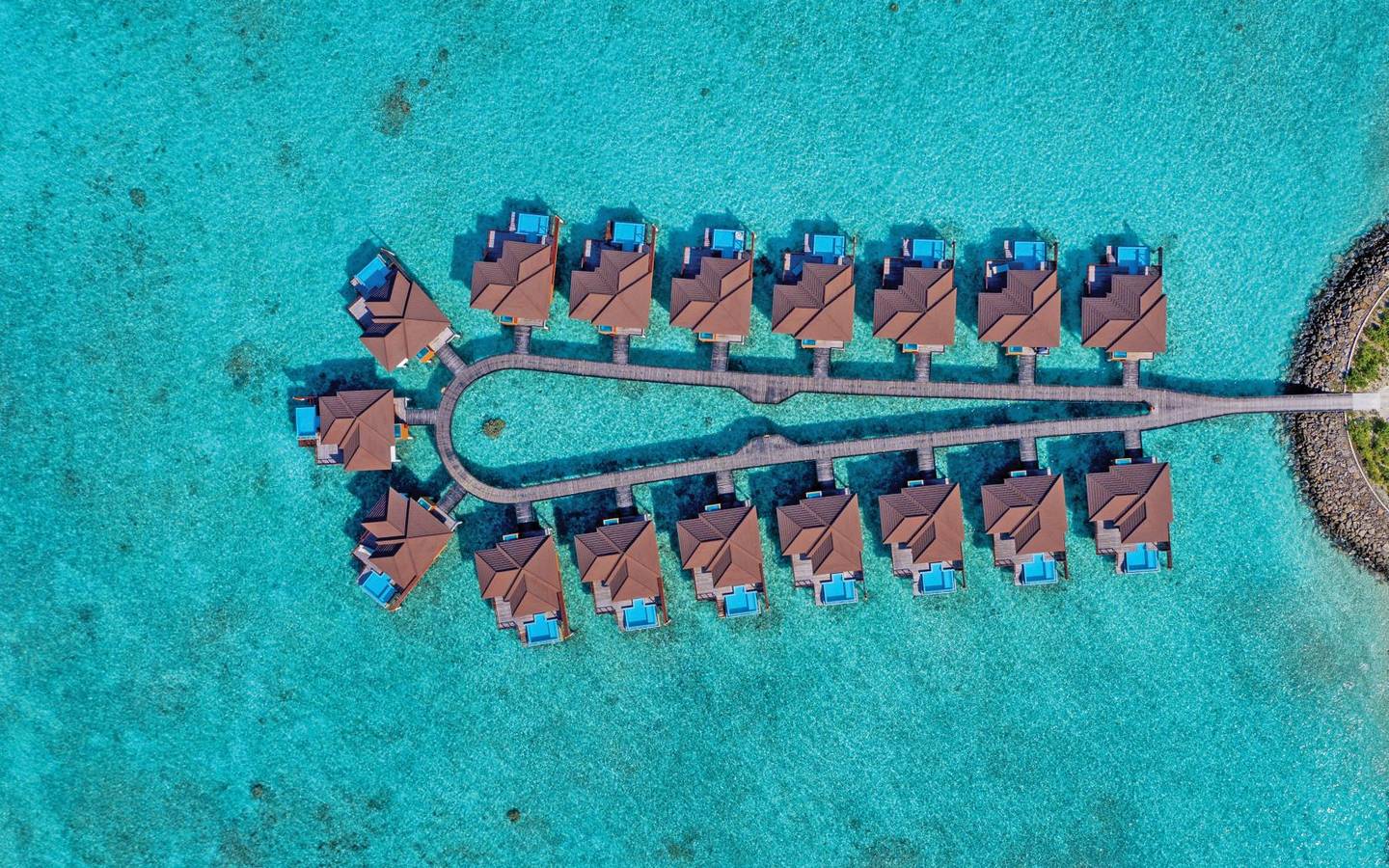 varu-by-atmosphere-maldives-water-villa-with-pool-jetty-aerial