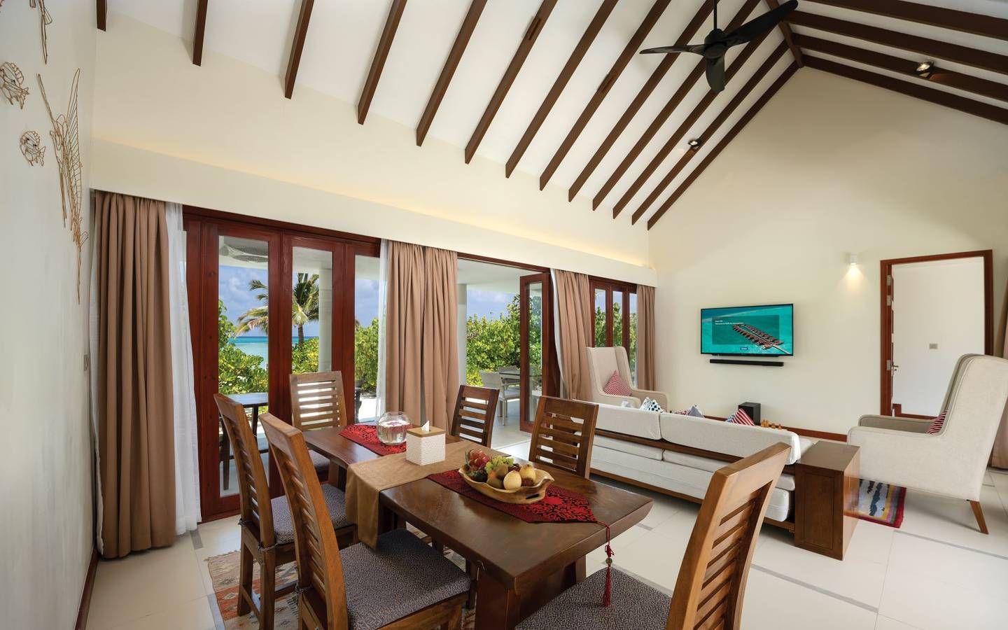 varu-by-atmosphere-maldives-the-majlis-suite-living-dining-room-2