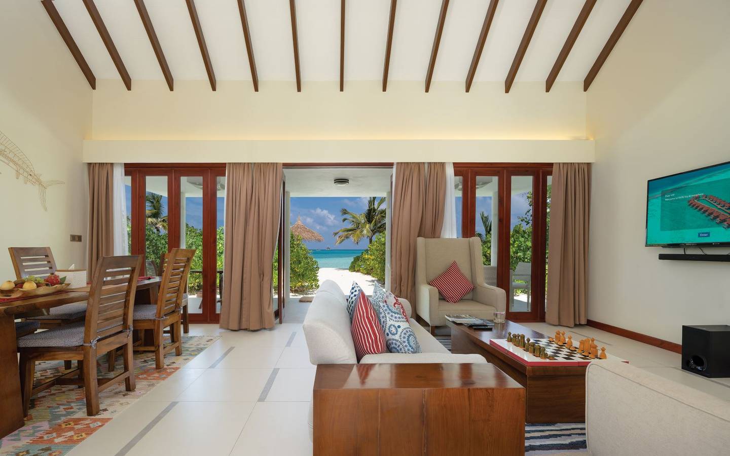 varu-by-atmosphere-maldives-the-majlis-suite-living-dining-room