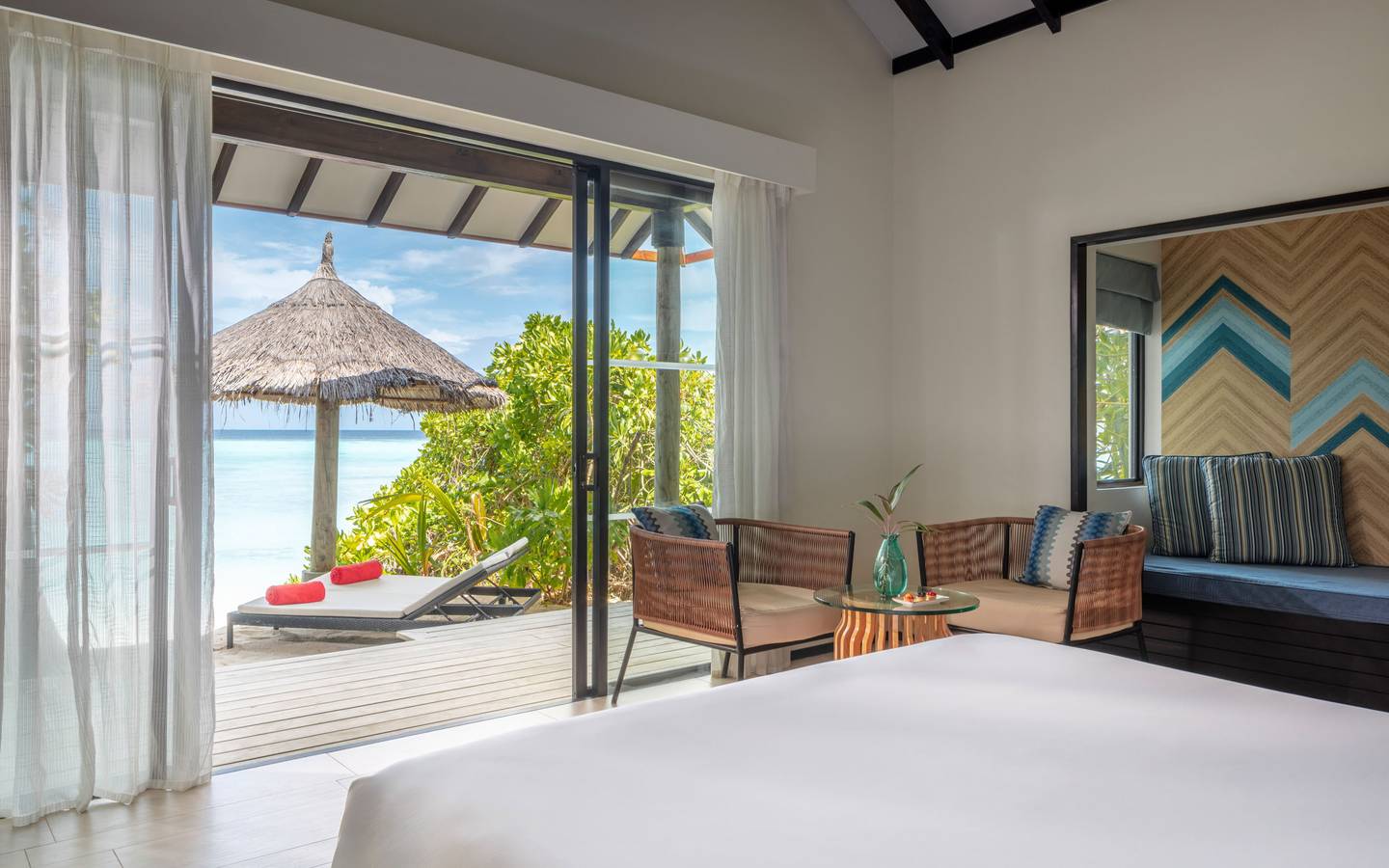 NH_Collection_Maldives_Havodda_Resort_Guest_Room_Beach_Villa_with_Private_Pool_Bedroom_Sunbed