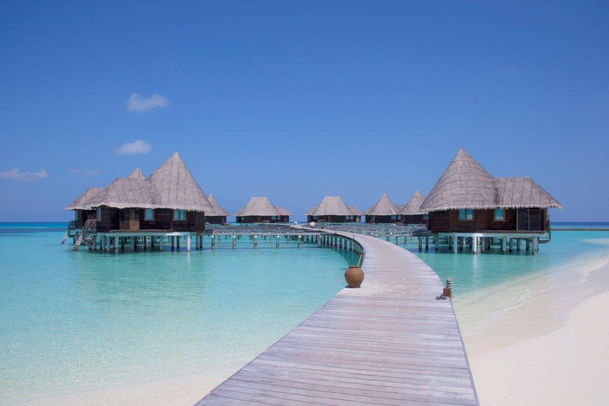 Coco Palm Duhni Kolhu, Malediven, Lagoon Villa, Steg mit Villen