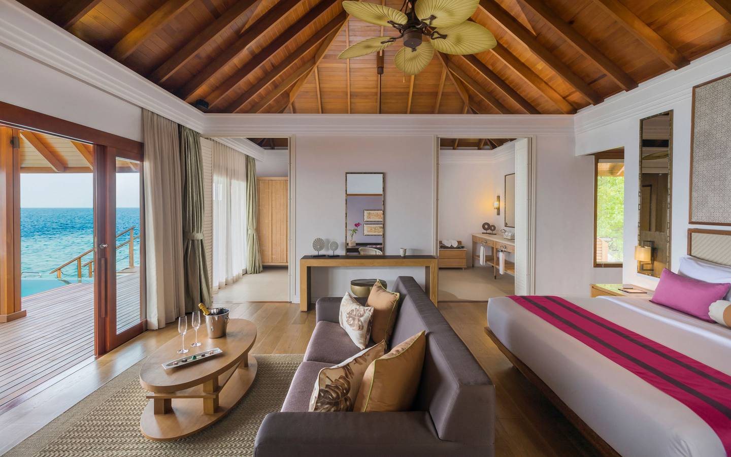 dusit-thani-maldives-accommodation-water-villa-with-pool-living-room-area