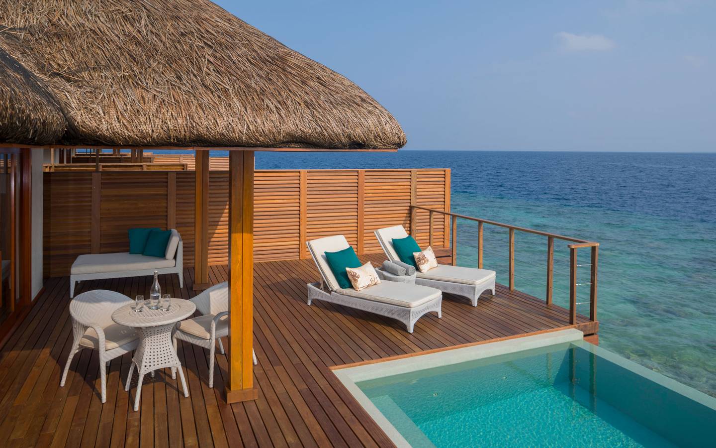 dusit-thani-maldives-accommodation-water-villa-with-pool-deck