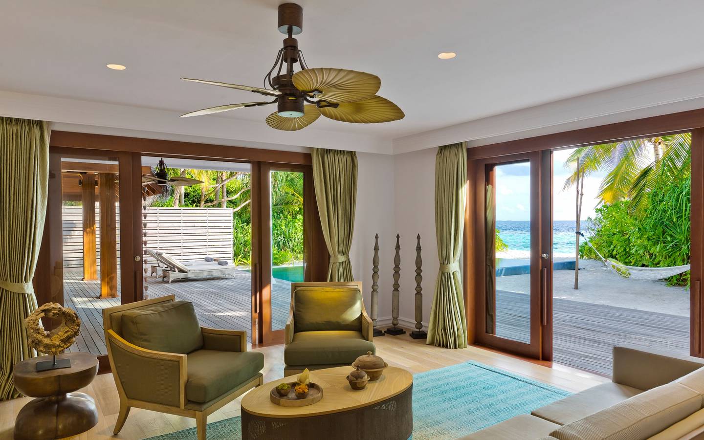 dusit-thani-maldives-accommodation-two-bedroom-beach-residence-pool-living-area