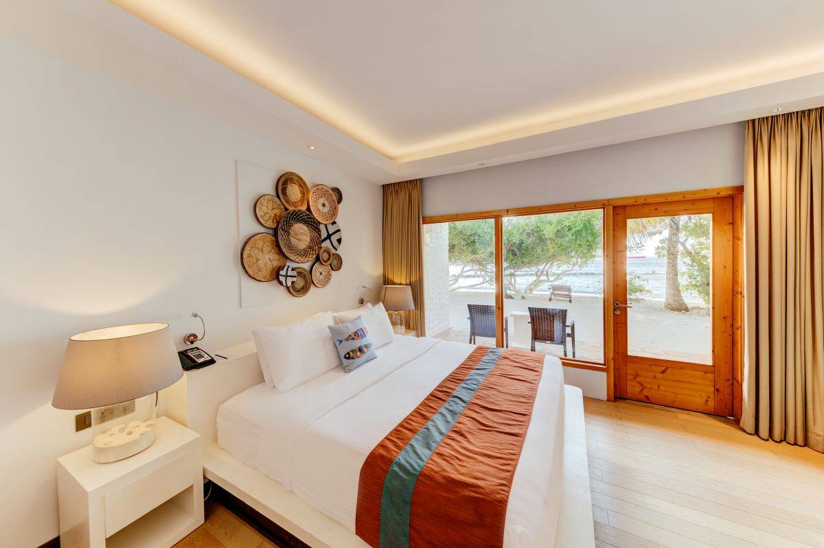 Cinnamon Dhonveli Maledives, Malediven, Superior Ocean View, Schlafzimmer und Terrasse