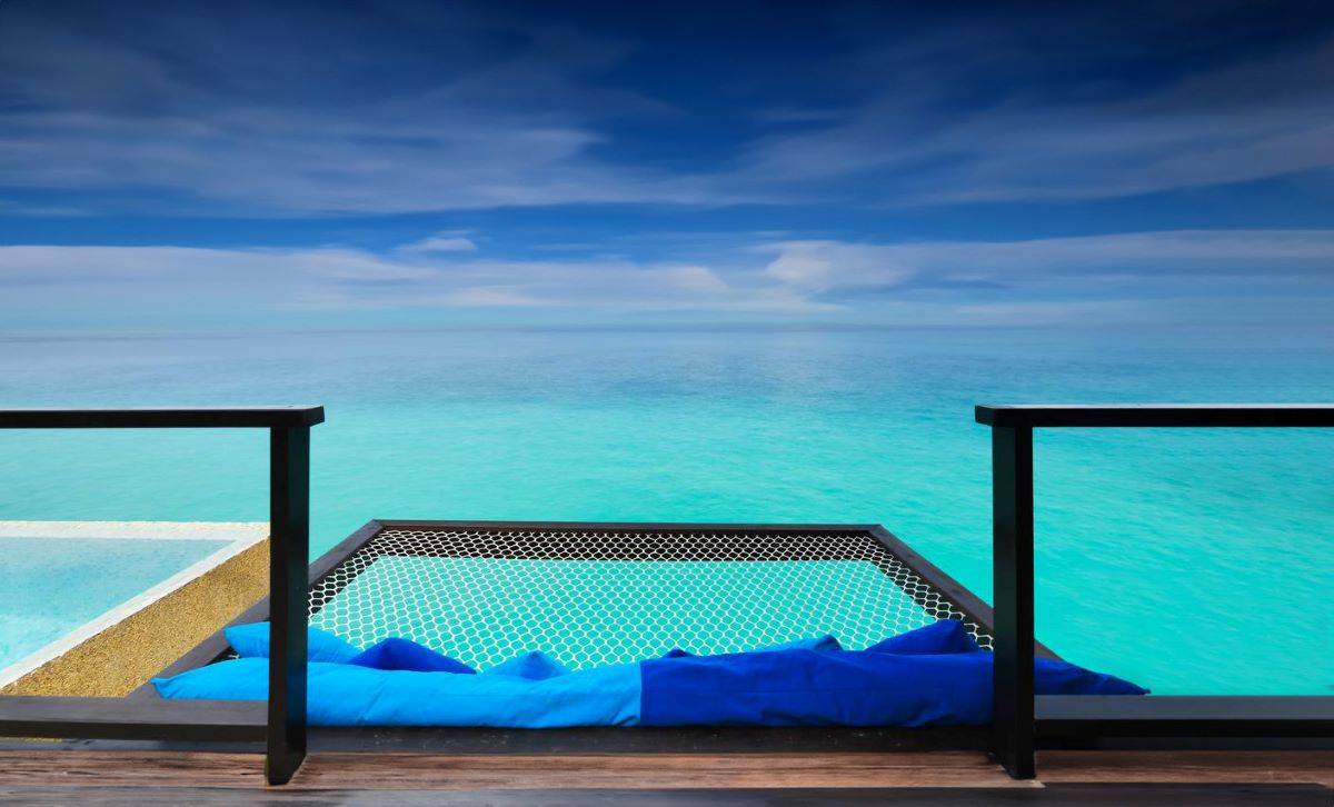 Coco Bodu Hithi, Malediven, Escape Water Villa, Überwasser Hängematte