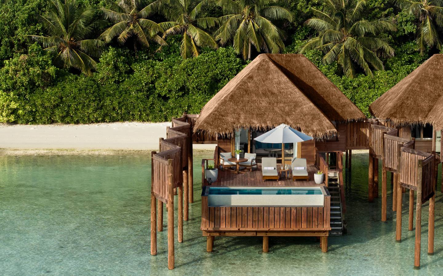 Conrad_Maldives_Sunset_Water_Villa_with_Pool_Aerial