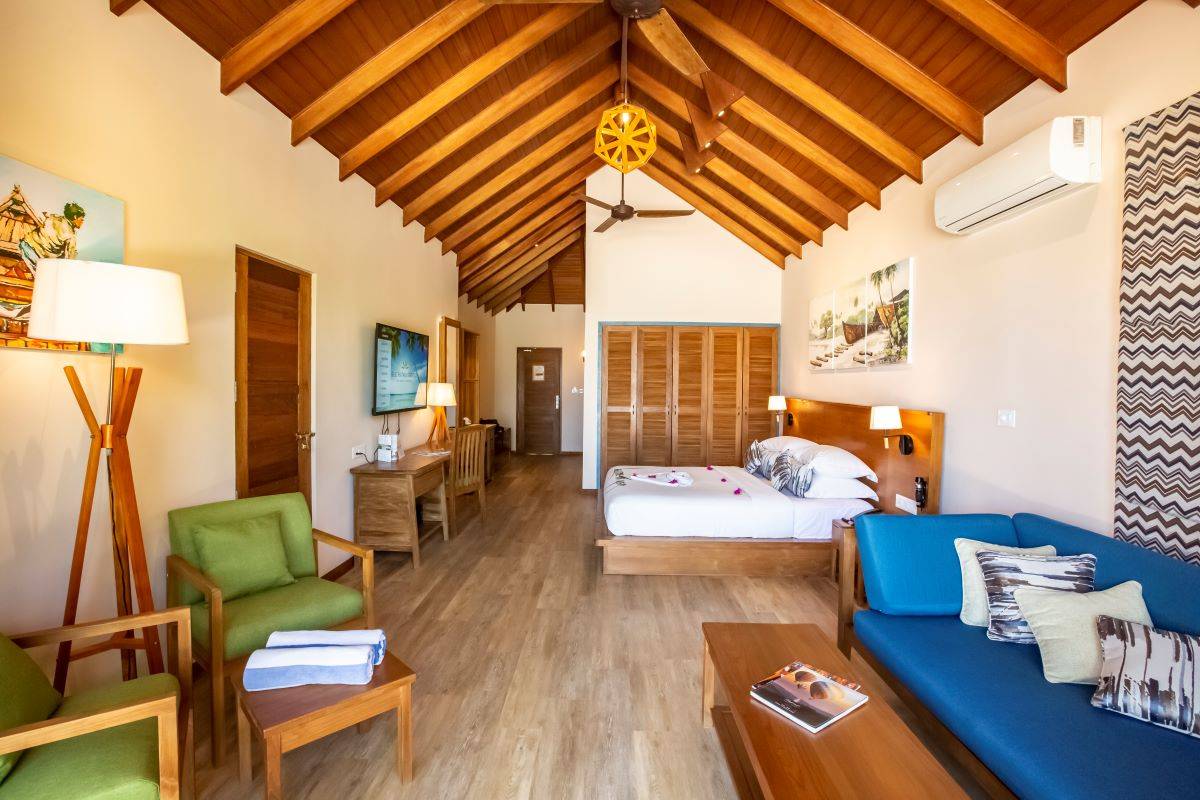 Reethi Faru Resort, Malediven, Deluxe Two-Bedroom Beach Suite, Sitzecke