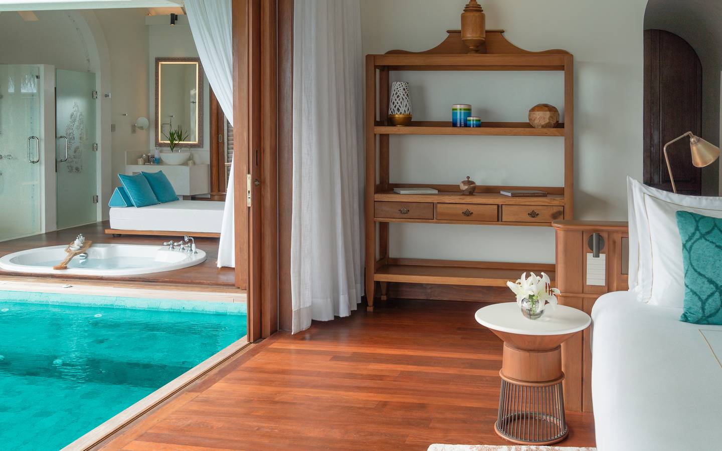 Anantara Kihavah - Over Water Pool Villa Bedroom with Pool and Bathroom View