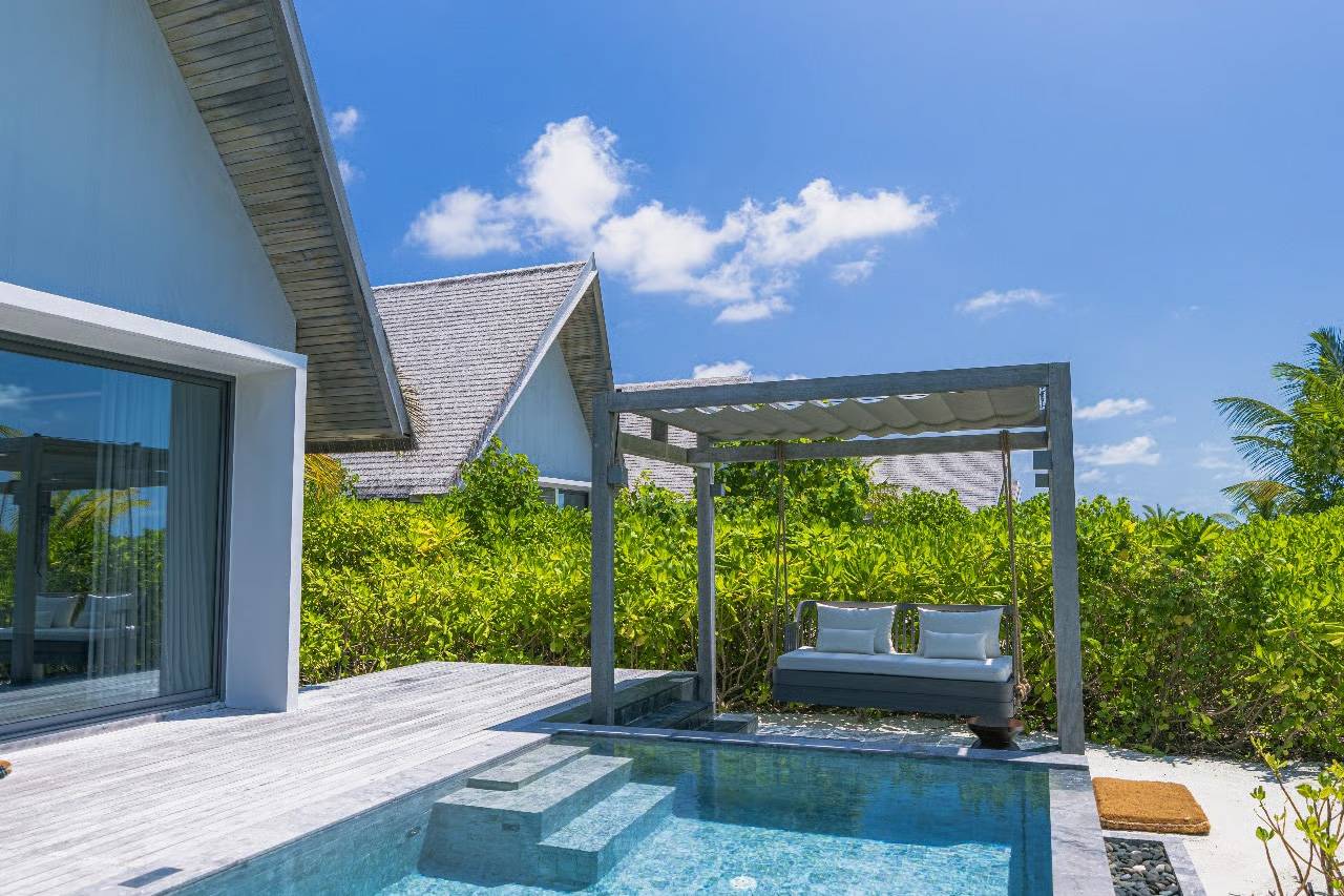 Madifushi_Private_Island_Maldives_Sunset_Serene_Pool_Villa_Aerial
