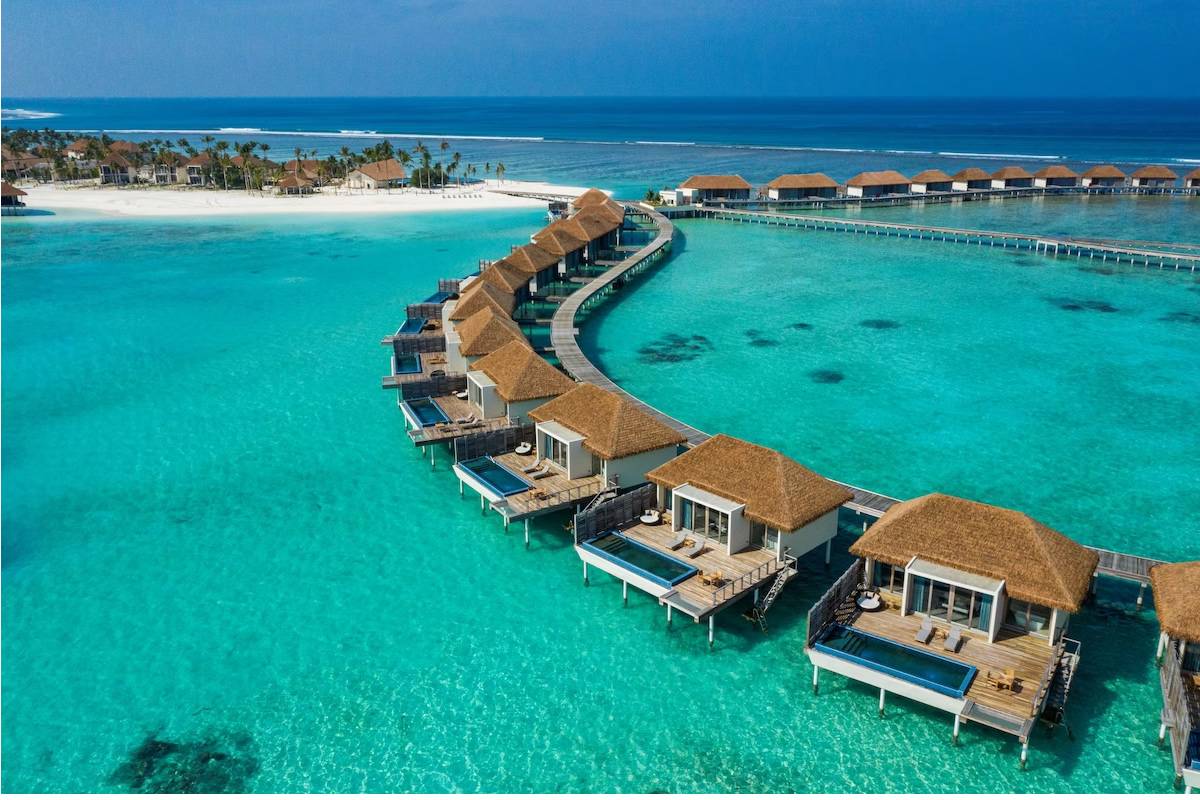 Überwasservilla Sonnenuntergang Radisson Hotel Maldives 1