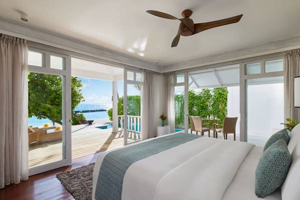 NH_Maldives_Kuda_Rah_Resort_Two_Bedroom_Duplex_Beach_Villa_with_Private_Pool_Bedroom_Looking_Out(1)