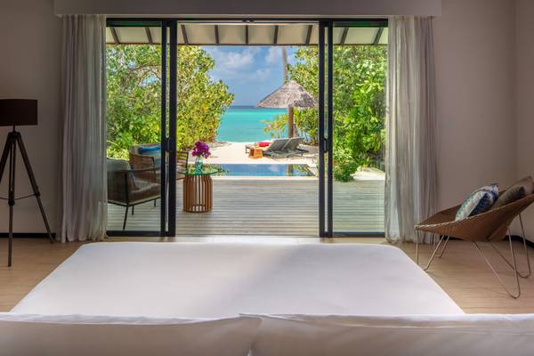 NH_Collection_Maldives_Havodda_Resort_Guest_Room_Sunset_Beach_Pool_Villa_Bedroom_with_View
