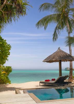 NH_Collection_Maldives_Havodda_Resort_Guest_Room_Sunset_Beach_Pool_Villa_Sunbed