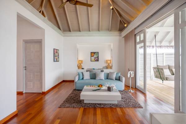 NH_Maldives_Kuda_Rah_Resort_Over_Water_Suite_with_Private_Pool_Living_Room