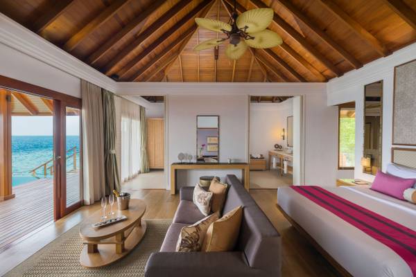 dusit-thani-maldives-accommodation-water-villa-with-pool-bedroom-area_2