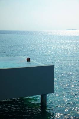 dusit-thani-maldives-water-villa-with-pool-exterior