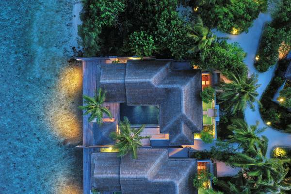 Naladhu_Private_Island_Maldives_Guest_Room_Ocean_House_with_Pool_and_Beach_Cabana_Aerial_Twilight