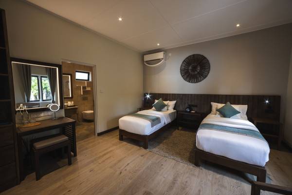 Kuredu_Resort_Maldives_Strandville_mit_zwei_Schlafzimmern_Schlafzimmer_1