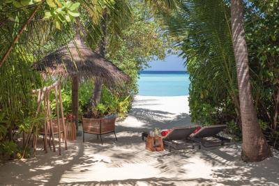 NH_Collection_Maldives_Havodda_Resort_Guest_Room_Sunset_Beach_Villa_Lounging_Area_Full